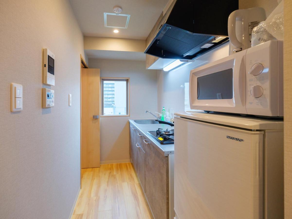 Dc桜の苑601洋室双人床 Hotell Osaka Exteriör bild